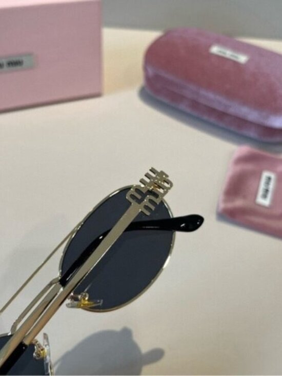 Miu Miu Gold Sunglasses with Black Lenses